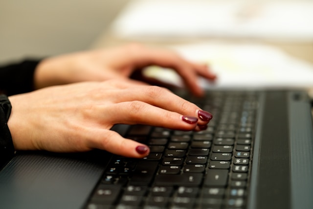 Virtual assistant working on a laptop